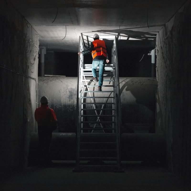 View of construction workers in a tunnel